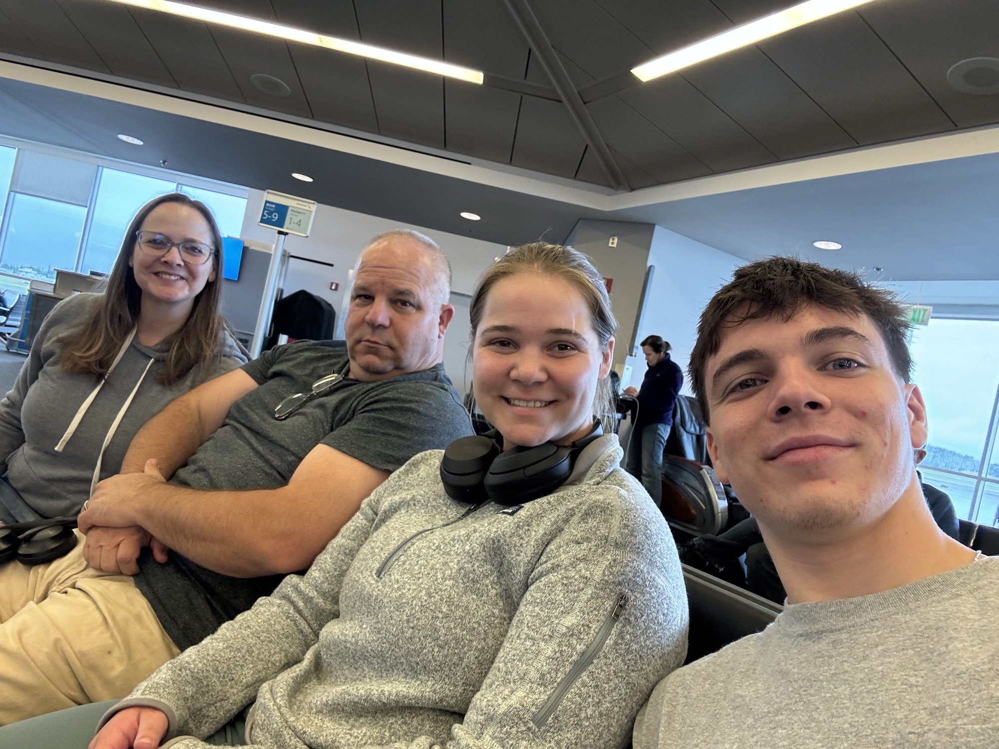family selfie in airport